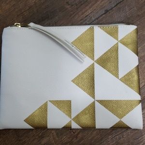 Moving Comfort Makeup bag White and gold peebled faux leather zip closure New